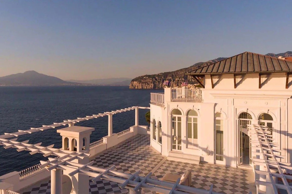 You are currently viewing Property ID: INT-1 – Discover the Elegant Villa Correale – A Luxury Cliffside Vacation Rental in Sorrento, Italy