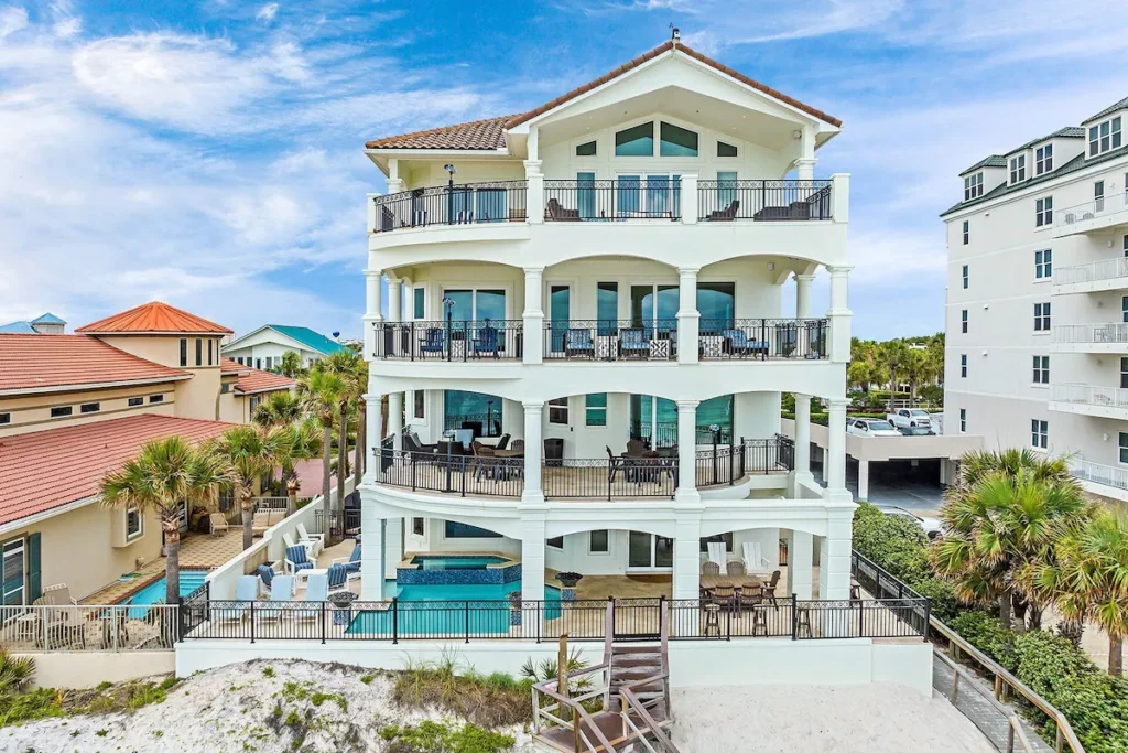 Luxury rental in Destin FL with beachfront pool and swim-up bar.