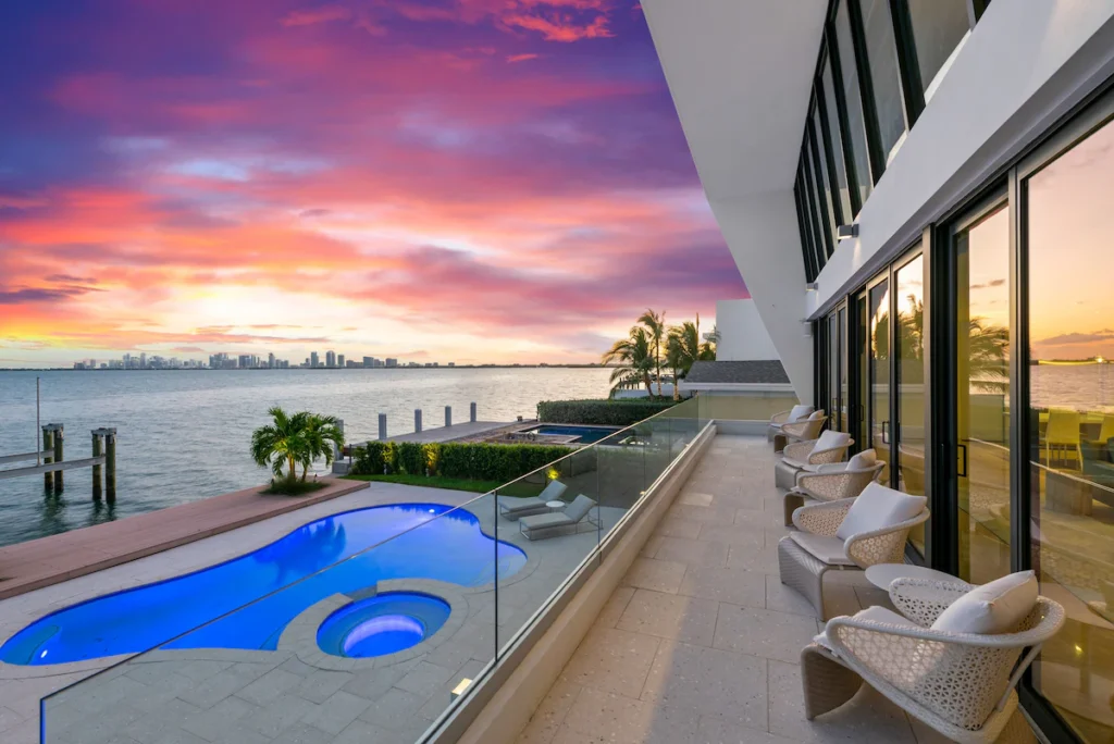 Luxury rental in North Bay Village with waterfront infinity pool and Miami skyline view.